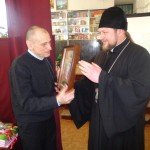 Благочинный поздравил Мелитопольского писателя с юбилеем. (22.04.2015)